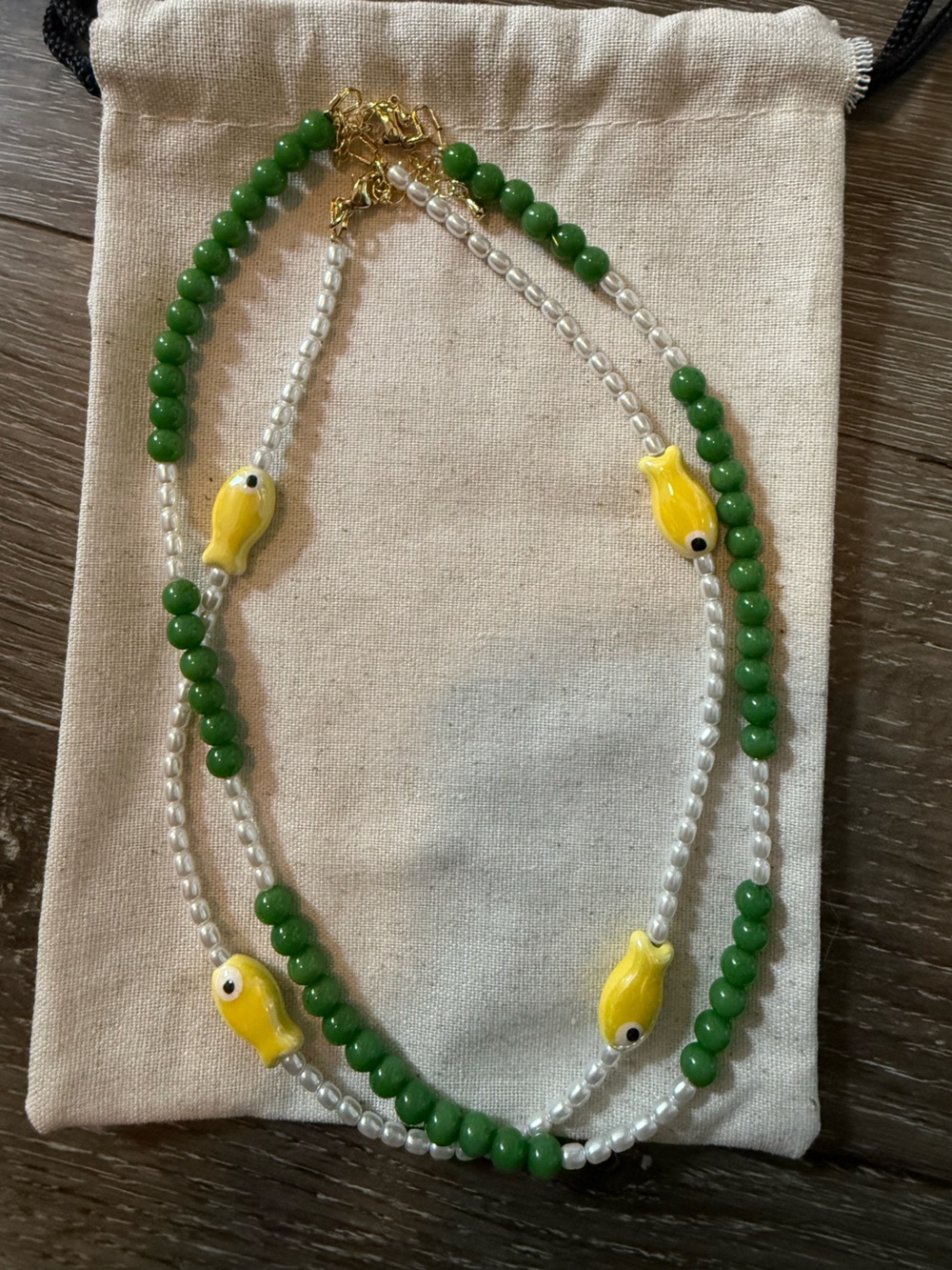 necklace bundle, pearls with yellow fish, green beads and pearls